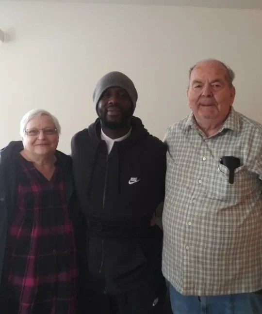 Happy Customers with Florida Moving Company Employee